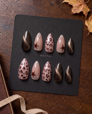 Brown cat-eye and pink leopard star press-on nails with silver rhinestones