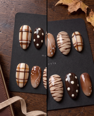 Brown plaid and abstract print press-on nails with glossy cream, caramel, and chocolate designs