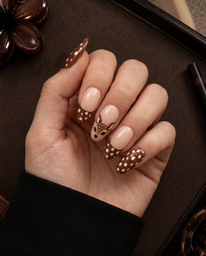 Brown glossy spotted deer press-on nails with nude sections and gold details
