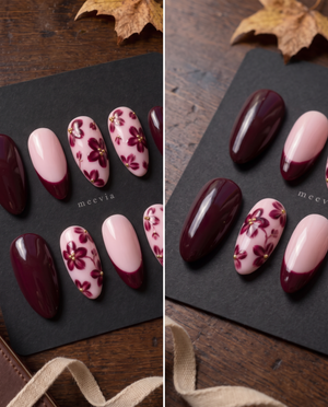 Burgundy floral French tip press-on nails with gold bead accents on a soft pink base