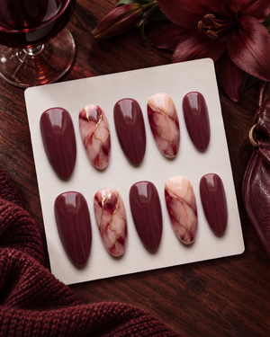 Burgundy and pink marble press-on nails with fine gold vein details