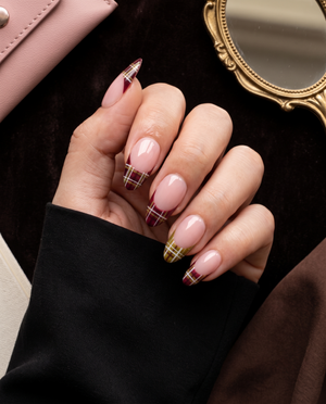 Burgundy plaid French tip press-on nails with glossy pink bases and white line details