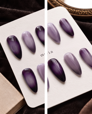 Glossy deep purple and lavender ombre almond press-on nails