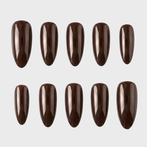 Ten press-on nails in a deep espresso brown color with a glossy finish displayed against a white background.