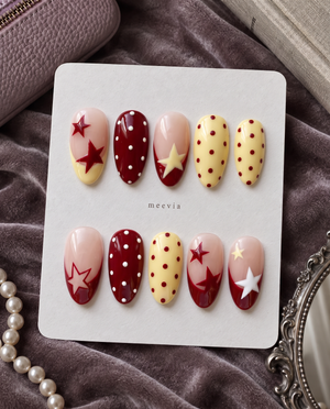 Red, yellow, and soft pink star and polka dot press-on nails
