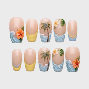 Tropical themed press-on nails featuring hibiscus flowers, palm trees, and wave designs on a nude base with French tips.