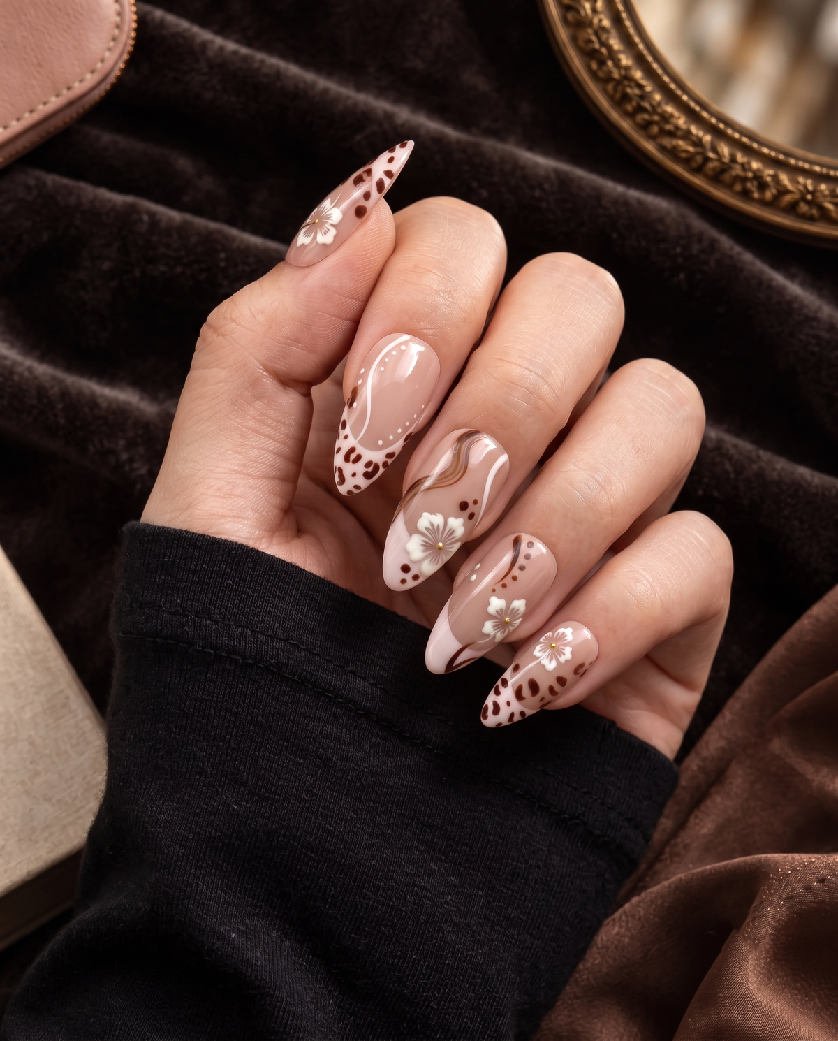 Brown floral leopard French tip press-on nails with glossy blush nude bases and white flowers