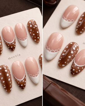 Brown and nude pink press-on nails with white polka dots, French tips, and scalloped accents