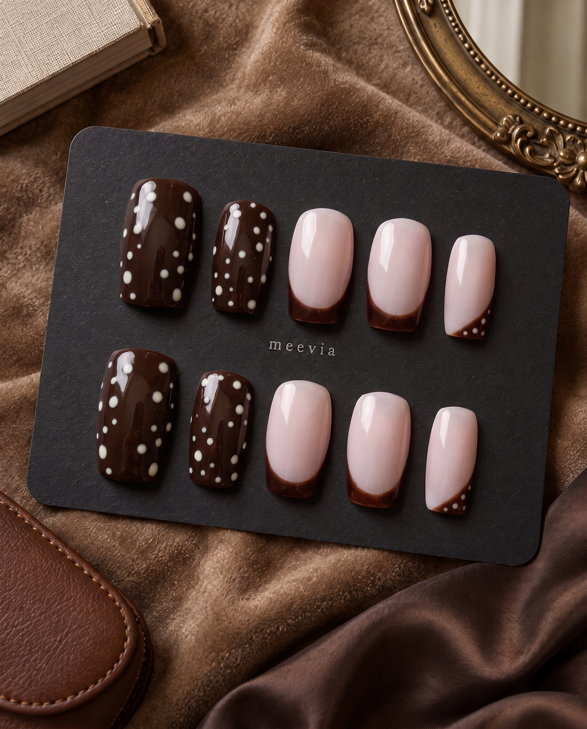 Brown and blush pink press-on nails with white polka dots and brown French tips