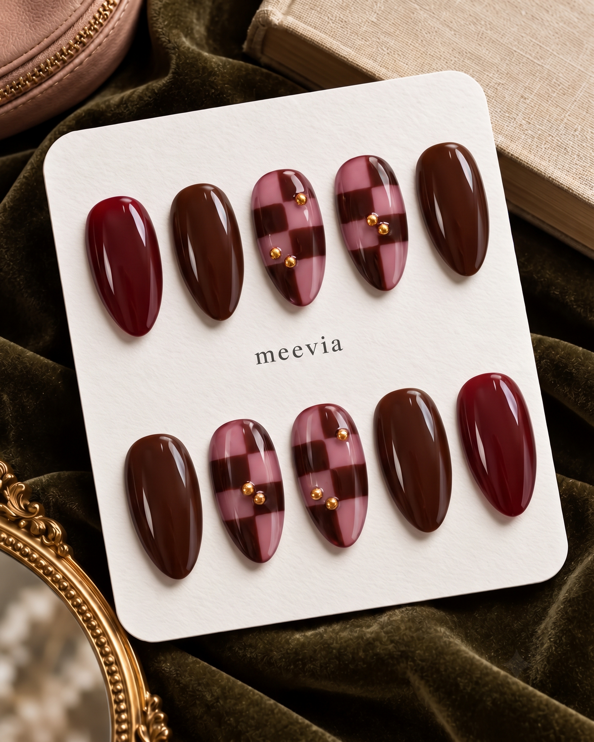 Burgundy and brown glossy checkerboard press-on nails with gold accents