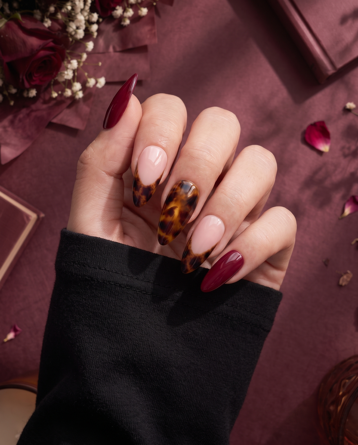 Burgundy and tortoiseshell French tip press-on nails with glossy finish