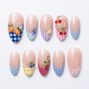 A set of press-on nails featuring gingham patterns, fruit motifs like oranges and cherries, and French tips on a white background.