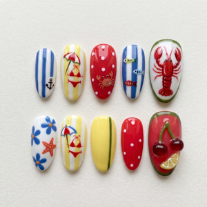 Nautical summer beach press-on nails featuring red lobster, crab, starfish, and 3D cherry designs.