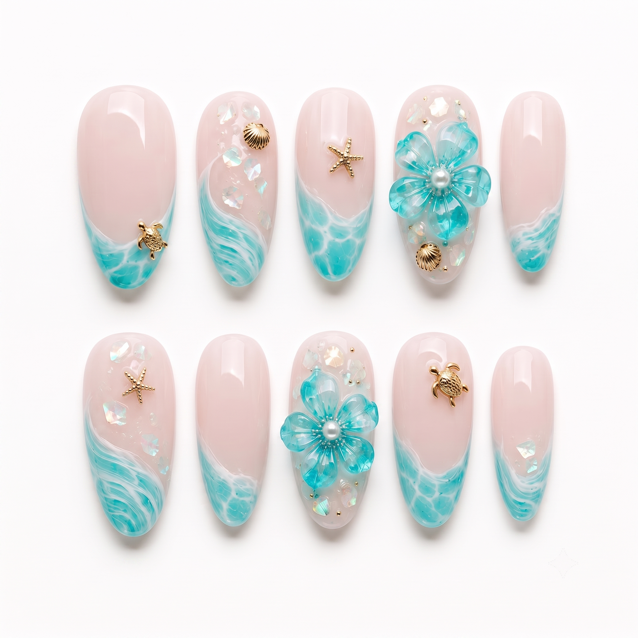 A set of sheer pink press-on nails featuring turquoise ocean wave designs, gold sea turtle and starfish charms, and 3D blue flowers with pearl details.