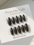 Long coffin-shaped gunmetal chrome press-on nail set with a metallic finish