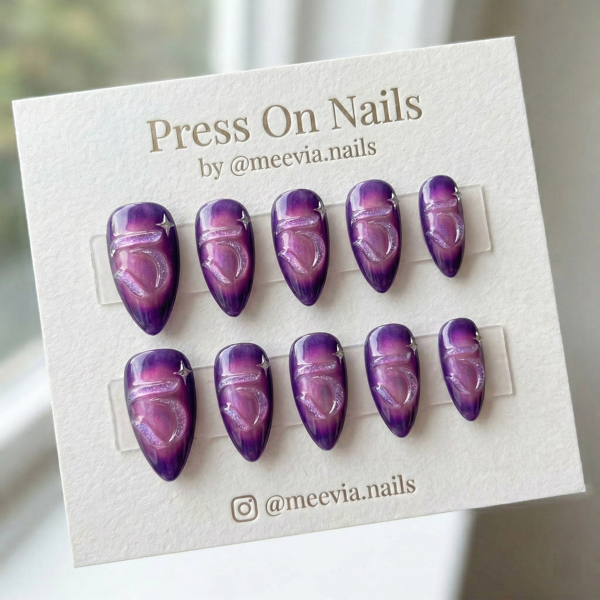 Almond-shaped black marble and 3D chrome press on nail set with gothic filigree art