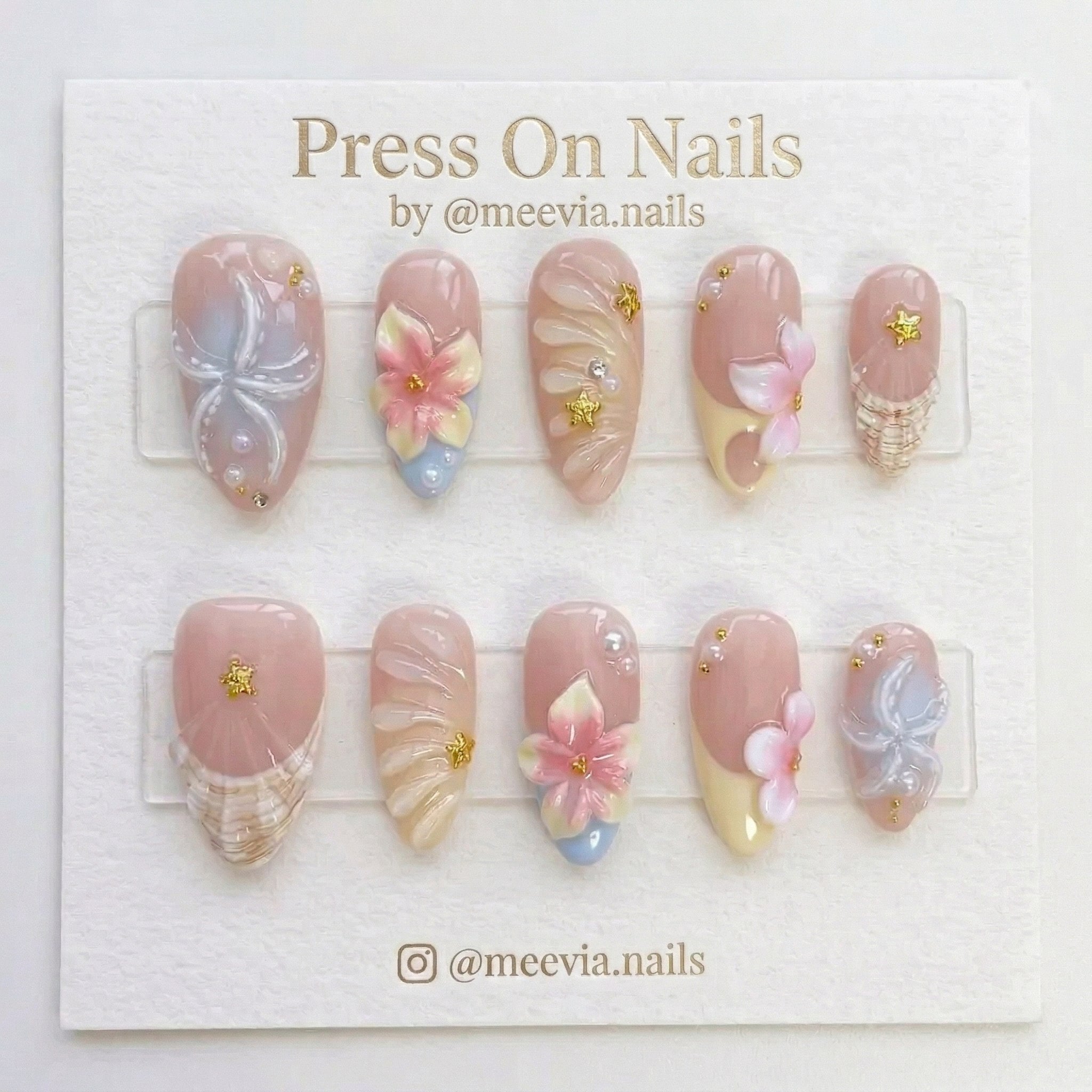 Almond-shaped 3D floral and shell press-on nail set with ocean motifs and pearls