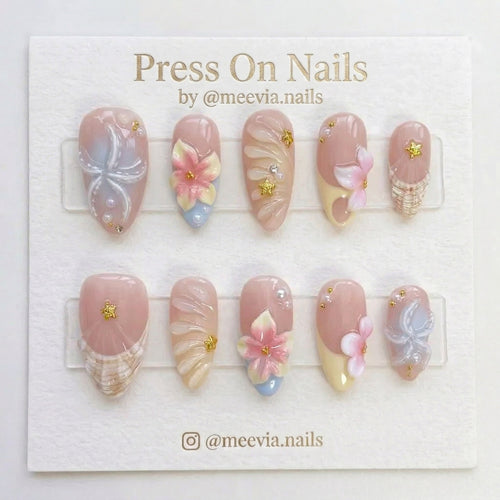 Almond-shaped 3D floral and shell press-on nail set with ocean motifs and pearls