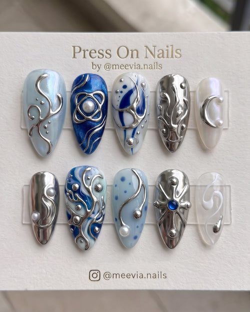 Stiletto-shaped 3D floral press-on nail set with pink and yellow jelly colors and pearl accents