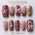 Square pink leopard print press-on nails with 3D bows and gold flowers