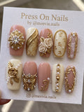 Long square nude and ivory press-on nails with 3D gold roses, pearls, and lace nail art