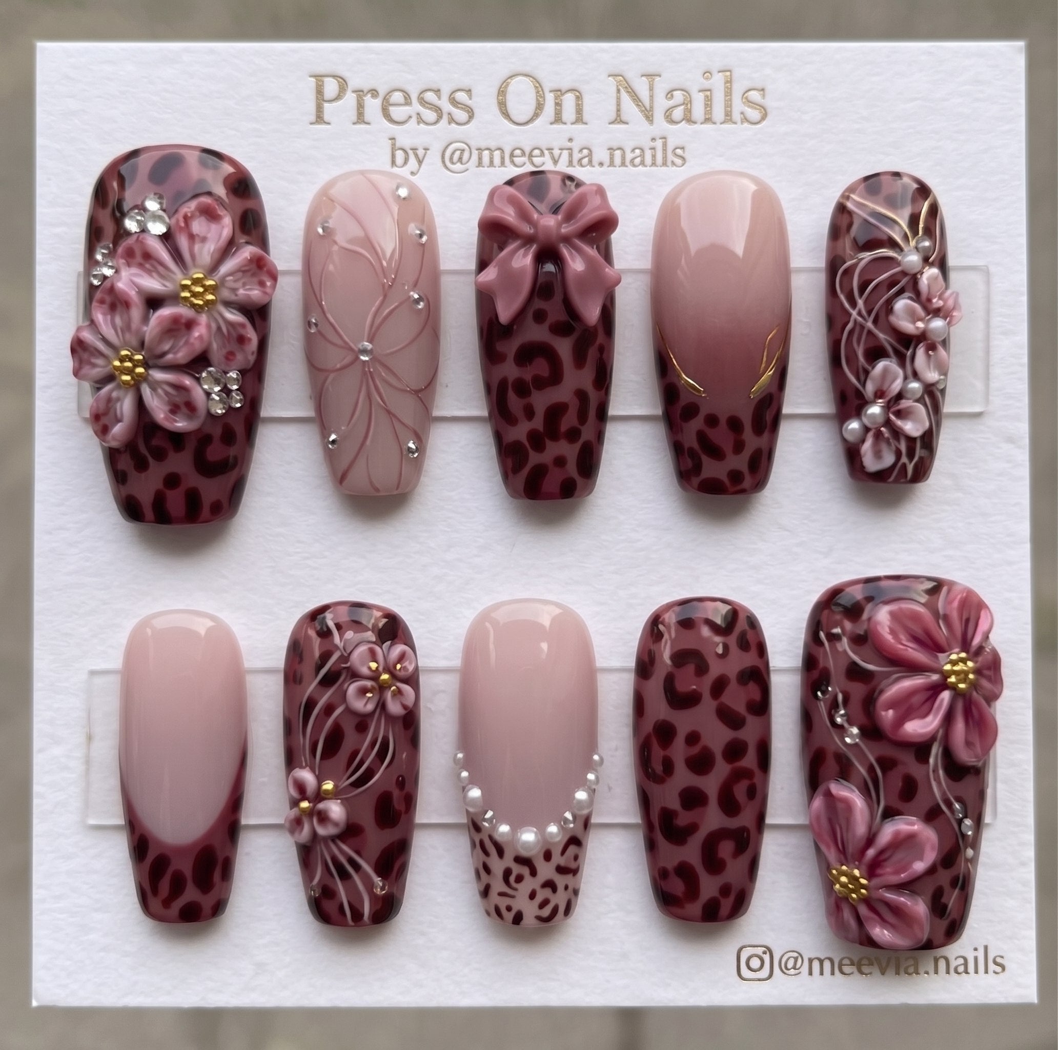 Coffin-shaped mauve leopard print press on nails with 3D pink flowers and bow