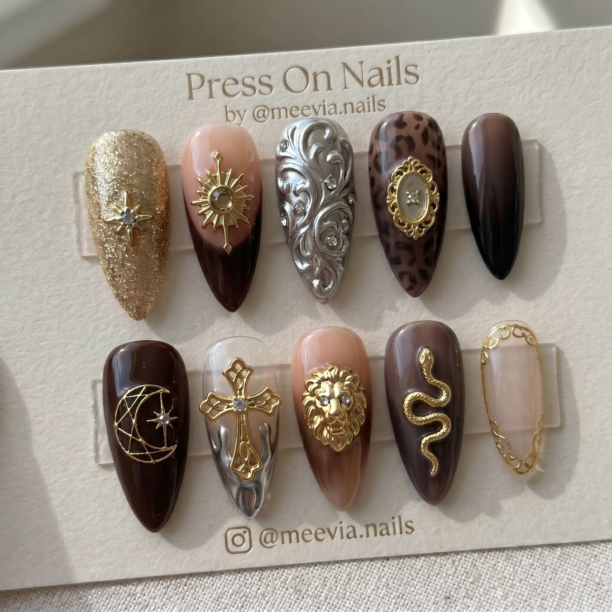Stiletto-shaped celestial baroque press-on nail set with 3D gold charms and leopard print