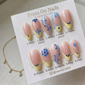 Almond-shaped celestial and 3D chrome press-on nail set with burgundy and silver accents