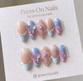 Almond-shaped pastel butterfly and floral 3D press-on nails