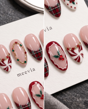 Pink Christmas press-on nails with plaid tips, holly berries, peppermint swirls, and glossy finish